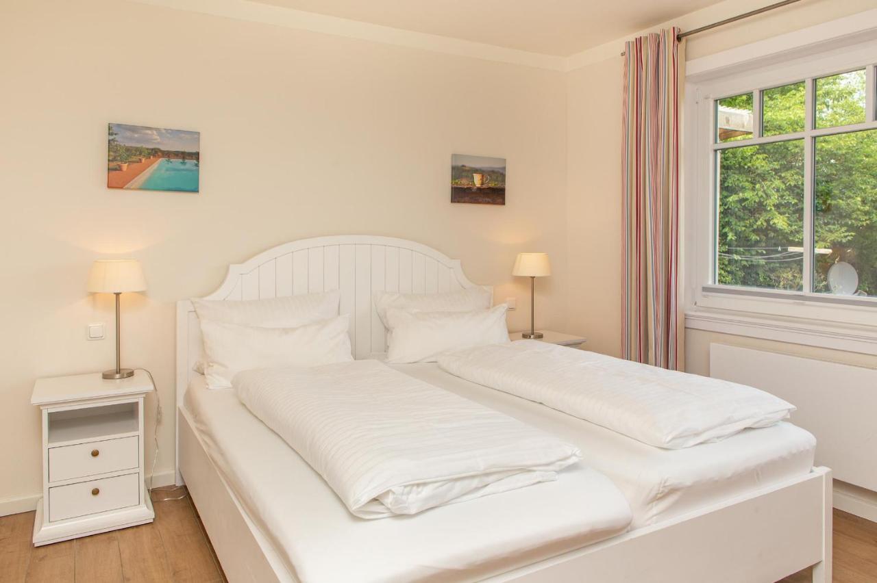 Haus Watthus - Wohnung Paradies Nebel Bagian luar foto